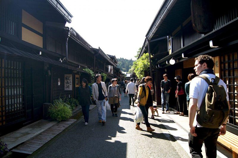 14 days in Japan an itinerary Takayama Looking down the narrow historic street of Sannomachi Street. One of the things you must see in Takayama during your two week trip around Japan