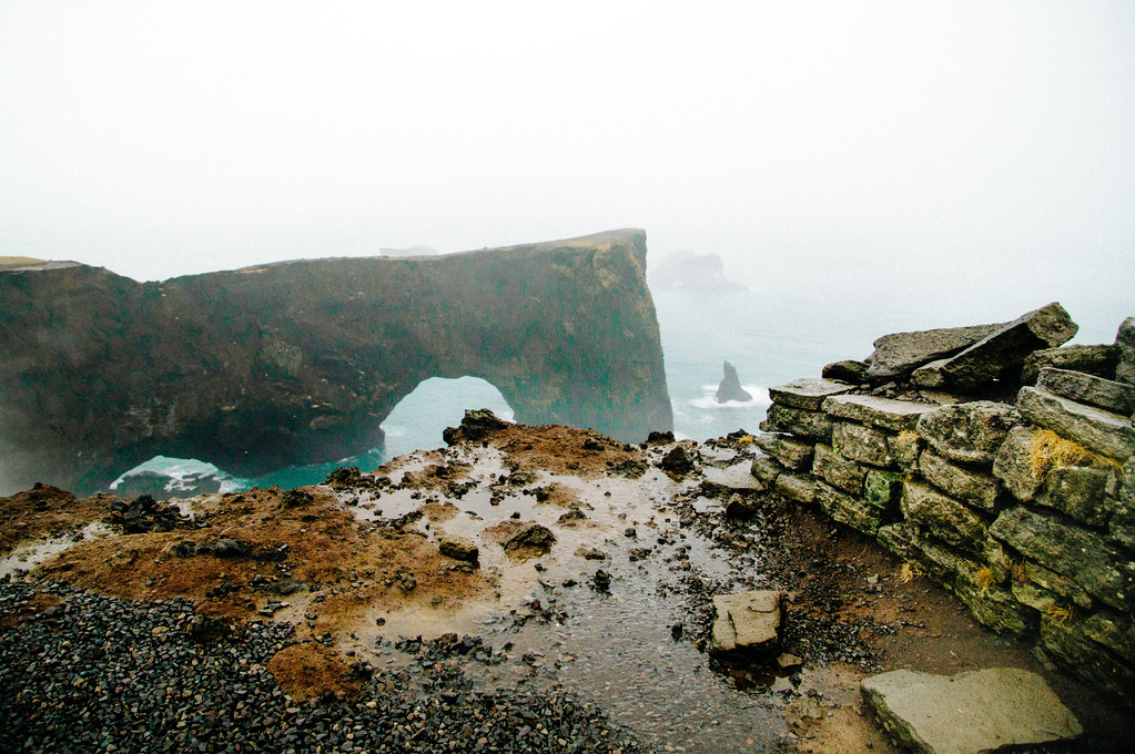 Dyrhólaey iconic arched rock and rocky outcrop