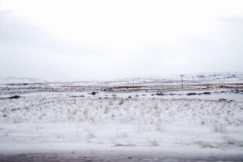 Iceland in winter covered in snow 1 Snow-covered landscape during a winter road trip in Iceland