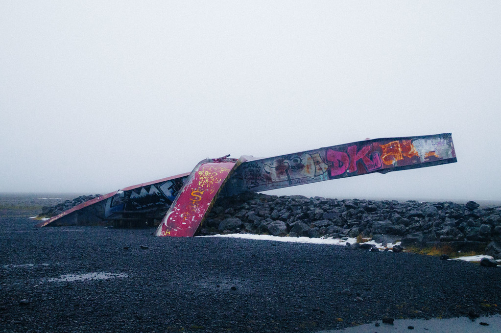 Metal fragments with graffiti in sandur iceland