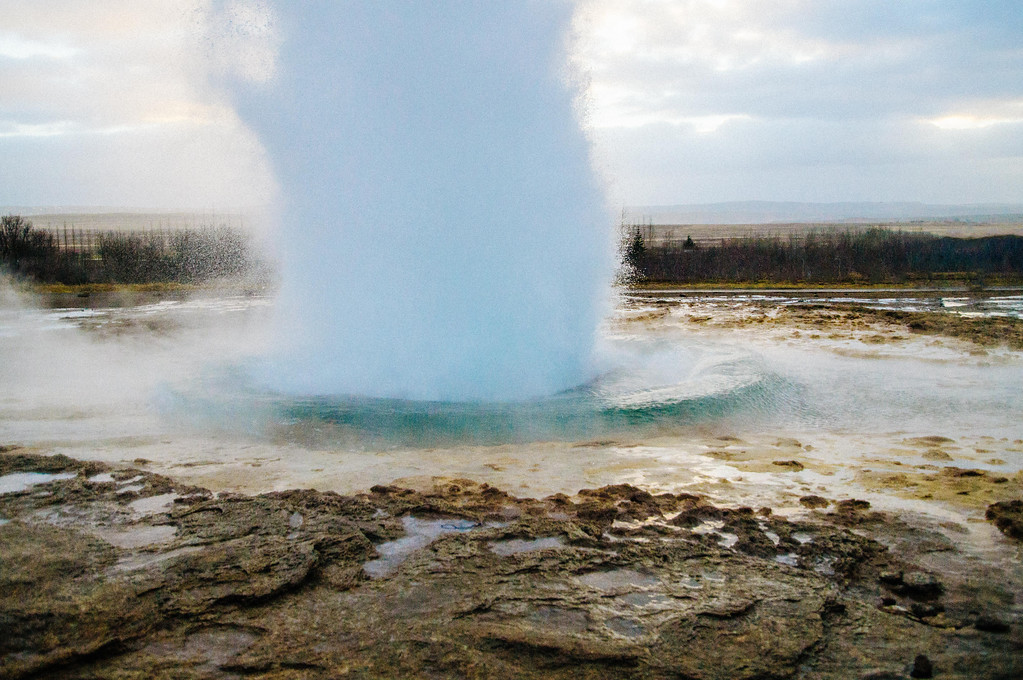 Steam rising after Strokkur geyser erupts