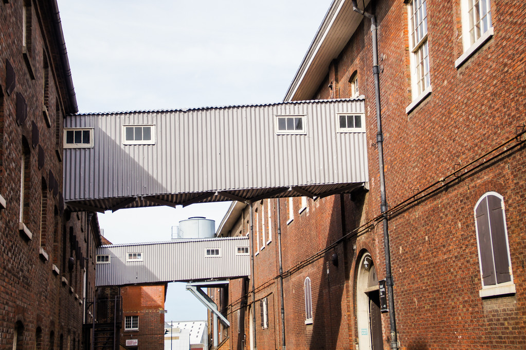 bridges between buildings in the anchor wharf store houses at the historic dockyard chatham