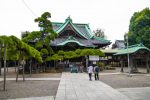Shibamata Taishakuten temple hall behind sculpted pine trees