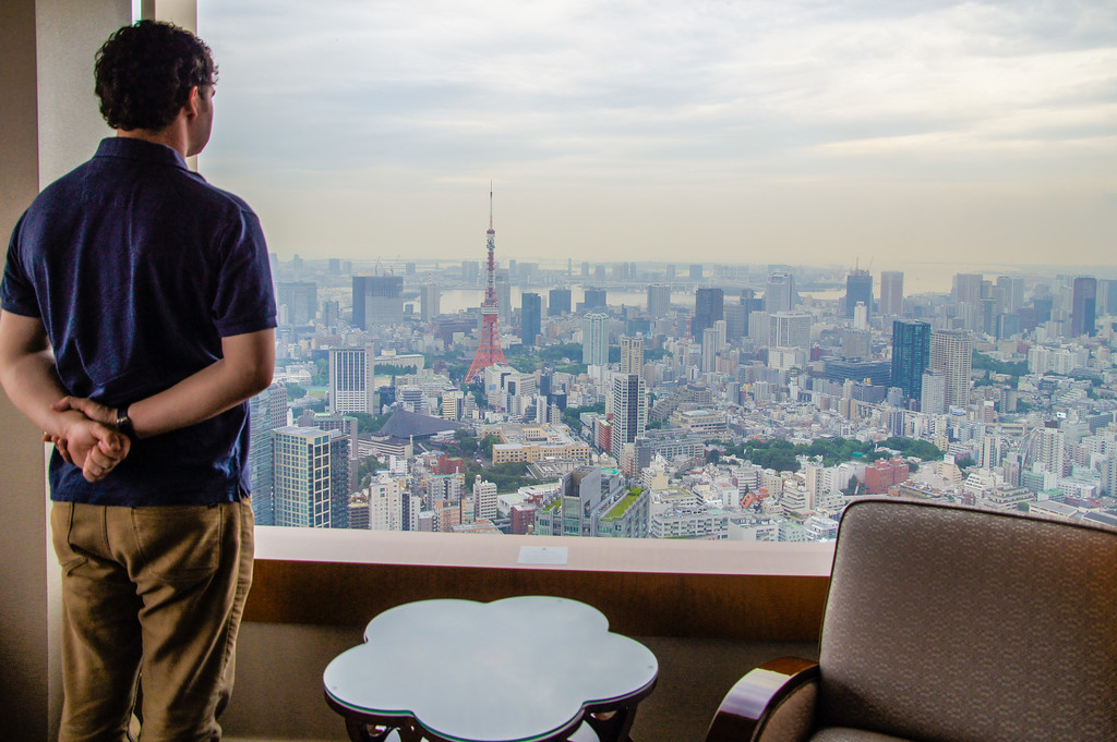 Husband enjoying view from the Millenia Suite in Ritz-Carlton Tokyo