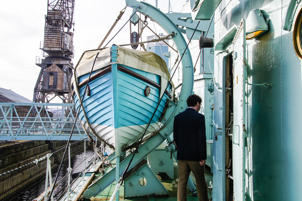 husband walking past life boat of the hms cavalier from outside at the historic dockyard chatham