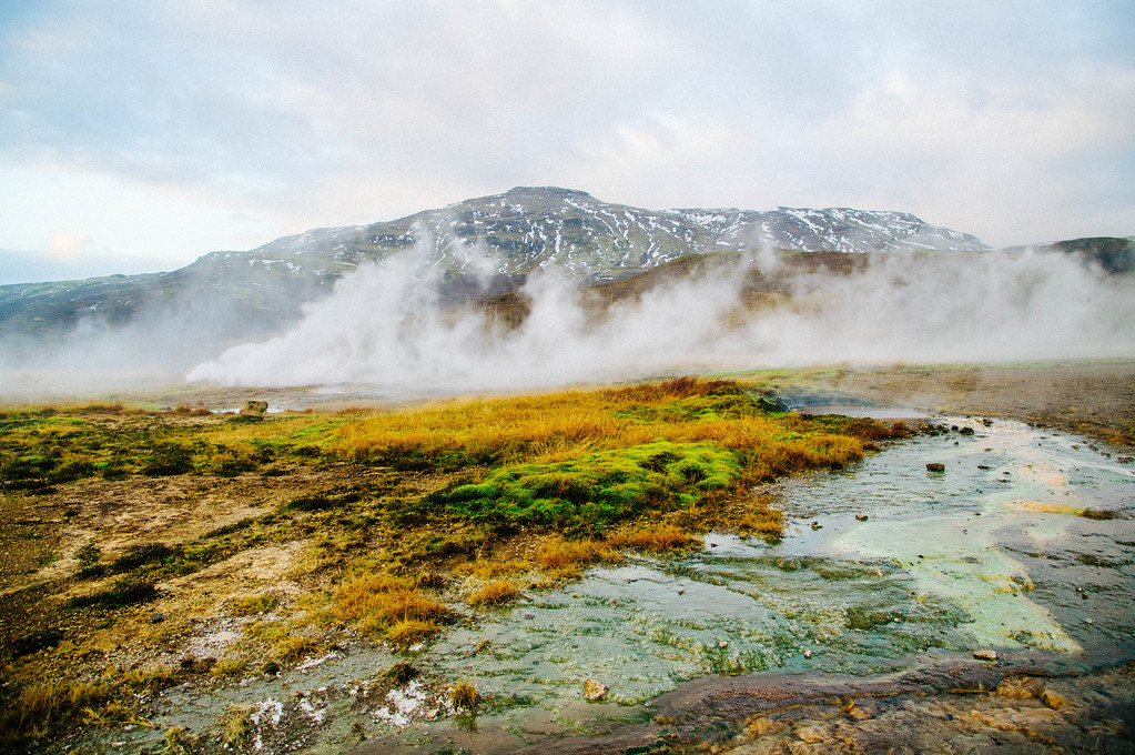 Mountains behind Geysir at the natural geothermal area beside the Hvítá River