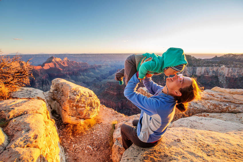 A mother with baby son in Grand Canyon National Park North Rim Arizona USA A mother with baby son in Grand Canyon National Park North Rim Arizona USA