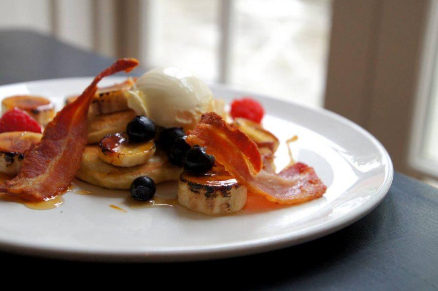 Blueberry Pancakes with Crispy Bacon Clotted Cream and Caramelized Banana for breakfast at the bel and dragon in odiham image 2
