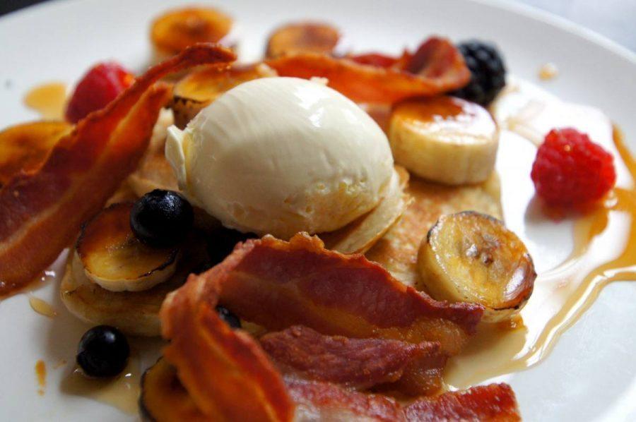 Blueberry Pancakes with Crispy Bacon Clotted Cream and Caramelized Banana for breakfast at the bel and dragon in odiham image 3