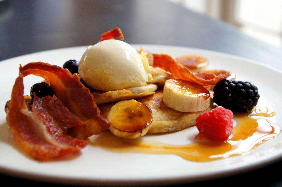 Blueberry Pancakes with Crispy Bacon Clotted Cream and Caramelized Banana for breakfast at the bel and dragon in odiham image 4