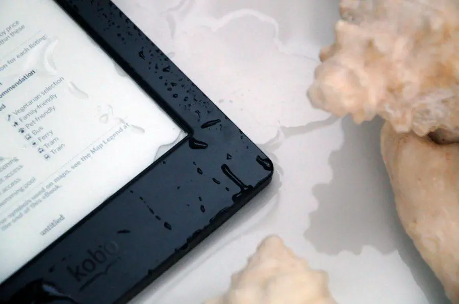 Close up of Kobo H2O Electronic reader covered in water Close up of Kobo H2O Electronic reader covered in water