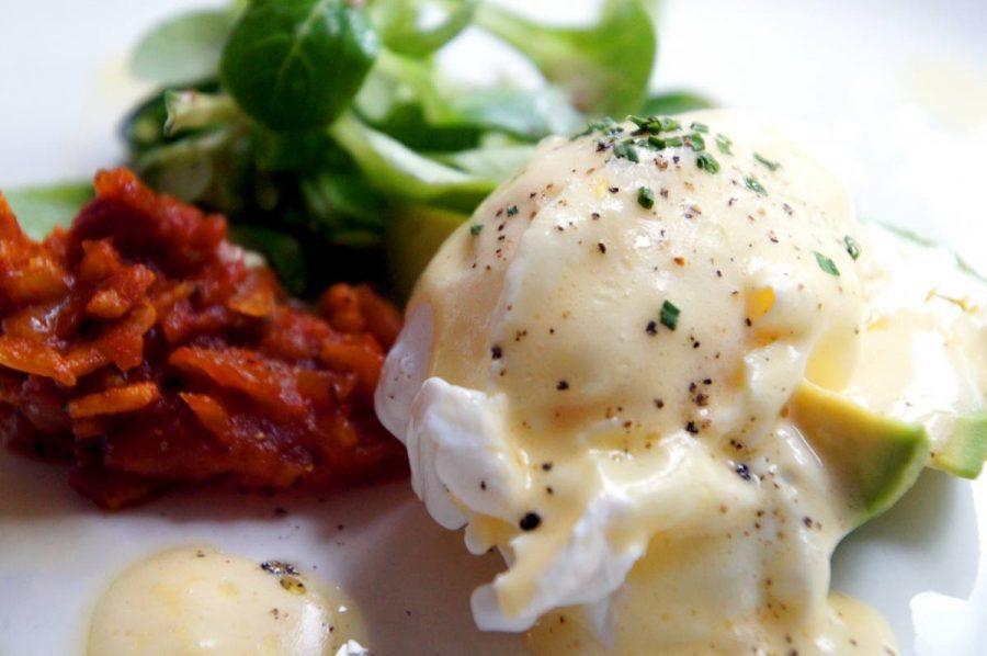 Poached Duck Egg served with Avocado Bacon Chutney and Hollandaise for breakfast at the bel and dragon in odiham image 3