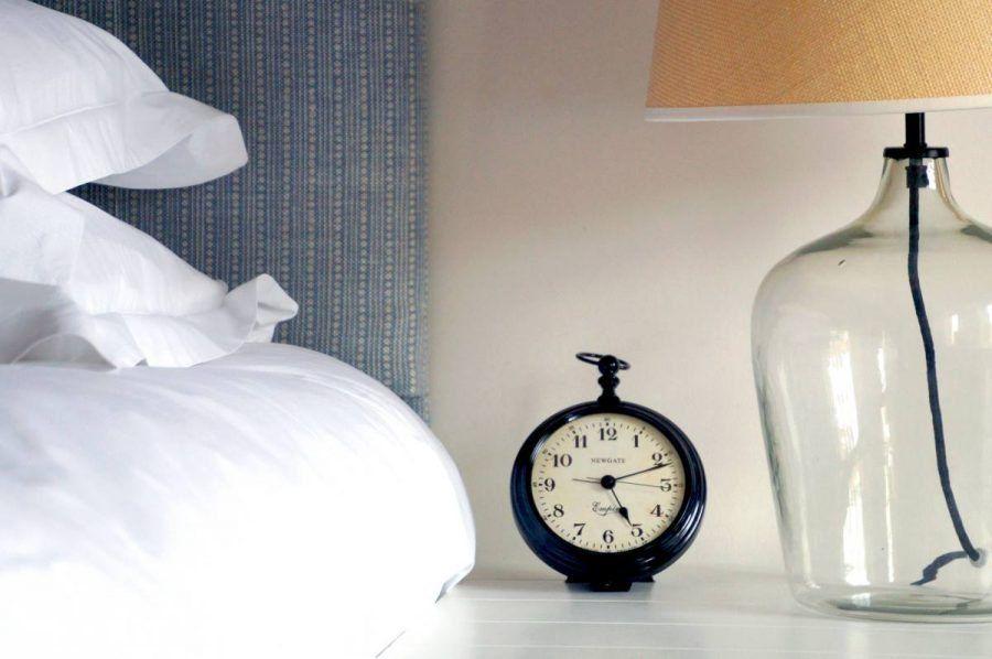 alarm clock on nightstand in the premium double en suite room the Damson at the bel and dragon in odiham