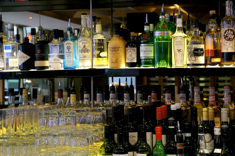 alcoholic drinks behind bar of rocket italian fusion restaurant in london alcoholic drinks behind bar of rocket italian fusion restaurant in london
