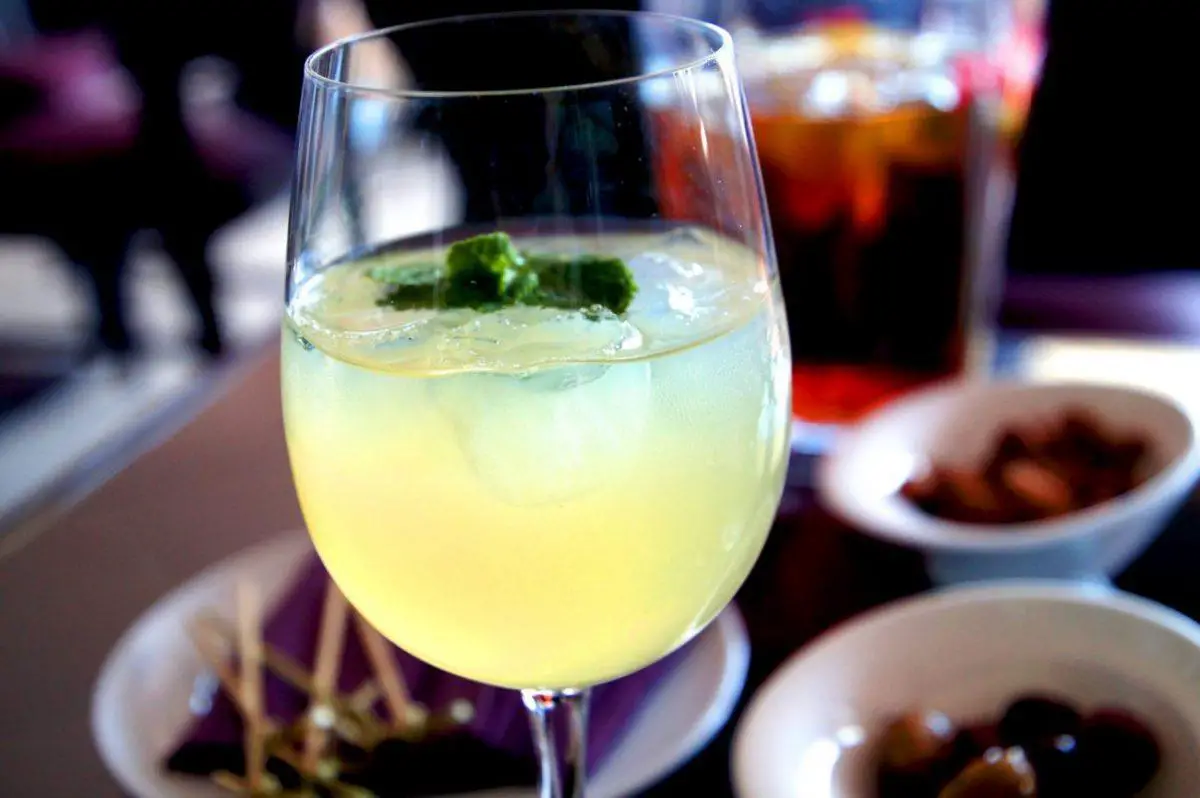 apple eldeflower and nettle cordial in the Fred Winter Suite of the Newbury Racecourse main field on al shaquab lockinge day