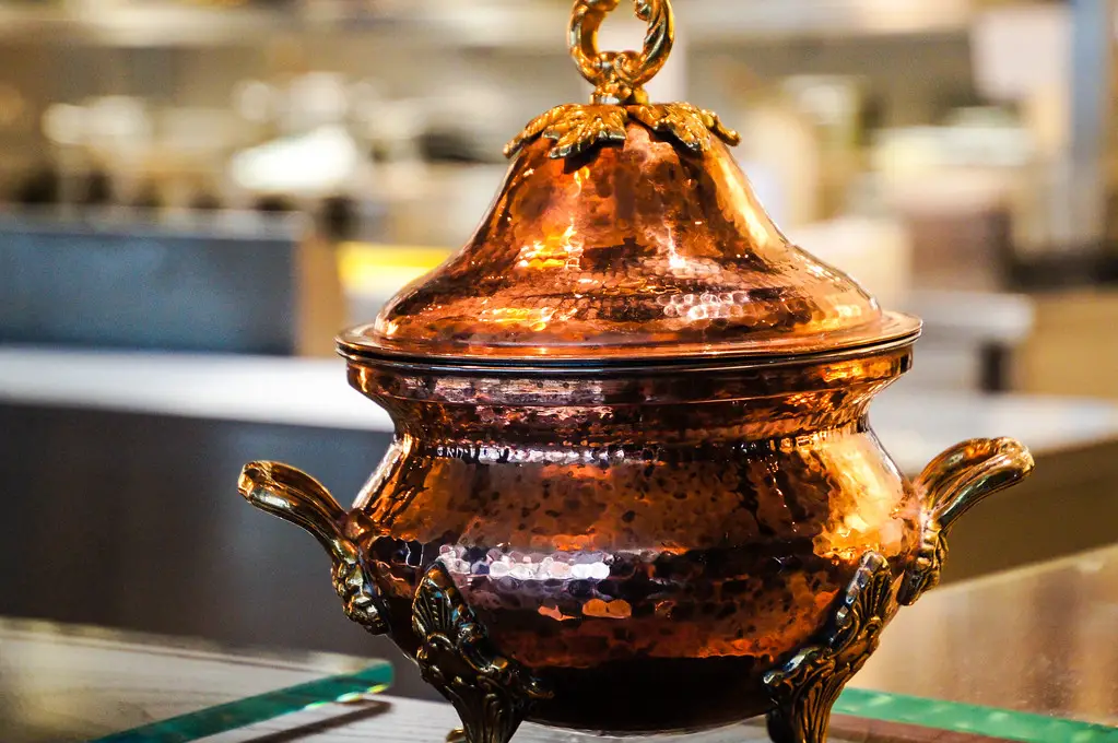 copper pot in open kitchen of modern indian restaurant dabaar in london