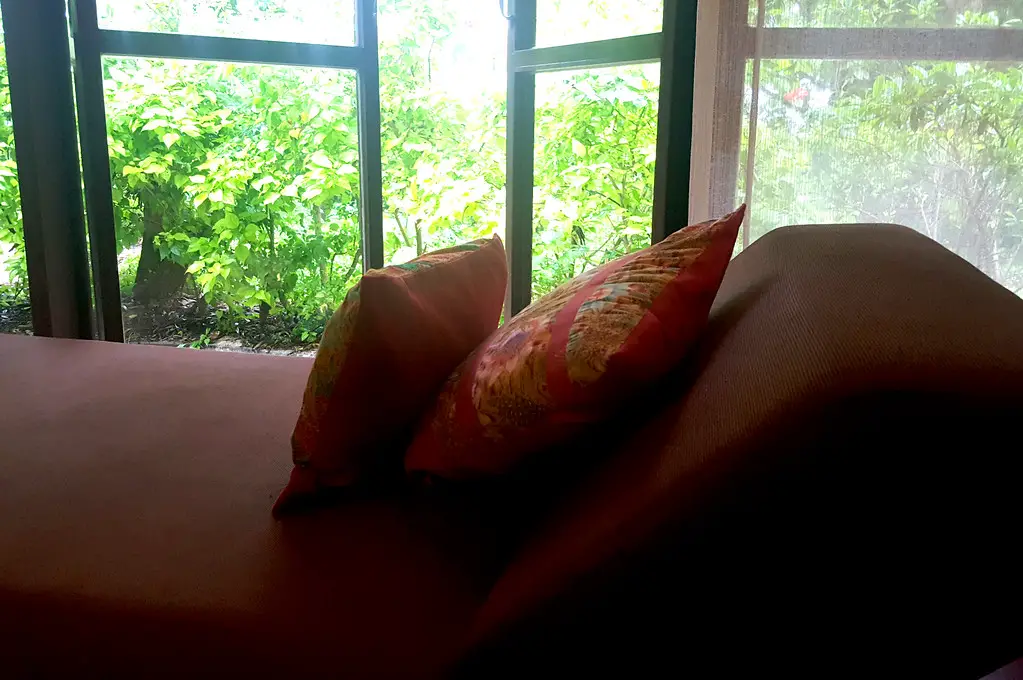 cushions on bench in bedroom in guest cabin at zeavola resort on Ko Phi Phi Island