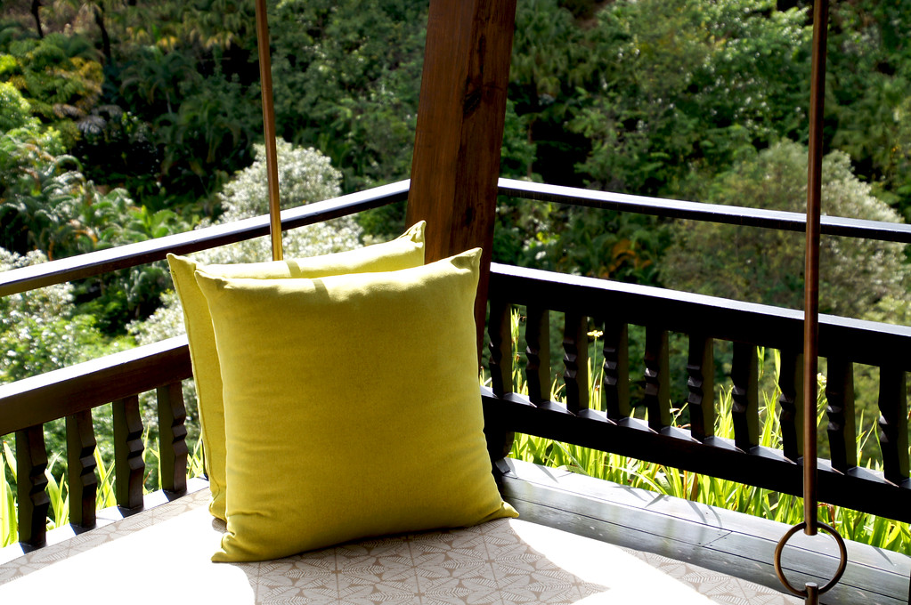 cushions on seating on terrace of main building of panviman chiang mai in thailand Cushions on seating on terrace of the main building at Panviman Chiang Mai Spa Resort