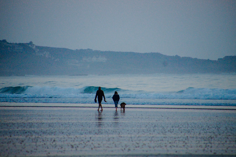 People walking along the beach at St Ouen's Bay, Jersey