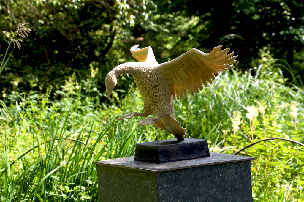 golden goose statue in garden of allah in borde hill gardens Golden goose statue in garden of allah in Borde Hill Garden