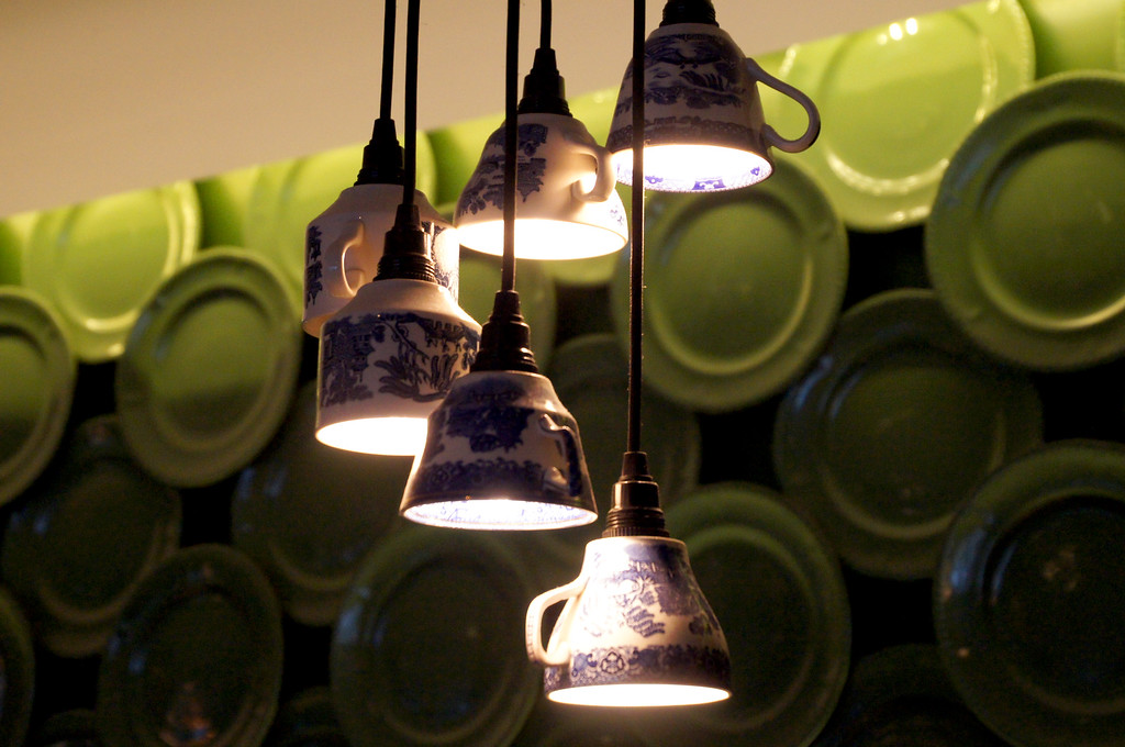 green plate wall art in rocket italian fusion restaurant in london green plate wall art in rocket italian fusion restaurant in london