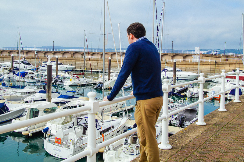 Gary looking at boats in Liberty Wharf, Jersey