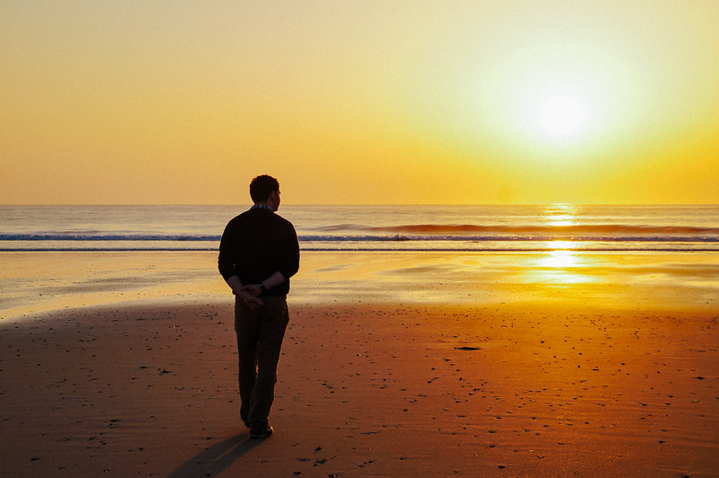 Gary looking at sunset in St Ouen's bay in Jersey