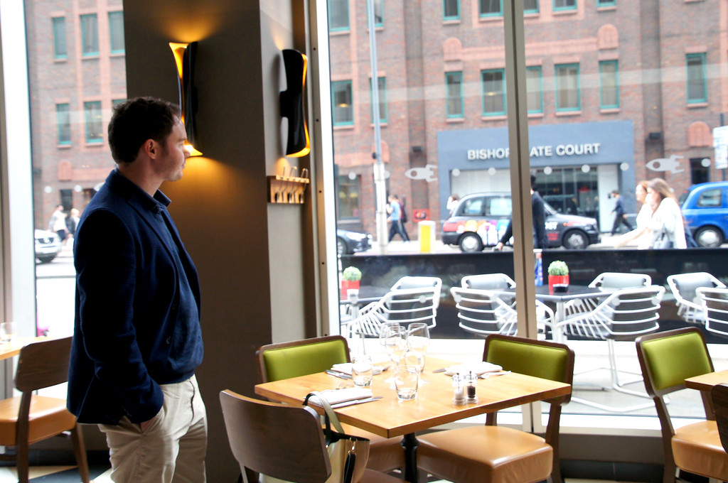 husband standing in rocket italian fusion restaurant in london husband standing in rocket italian fusion restaurant in london