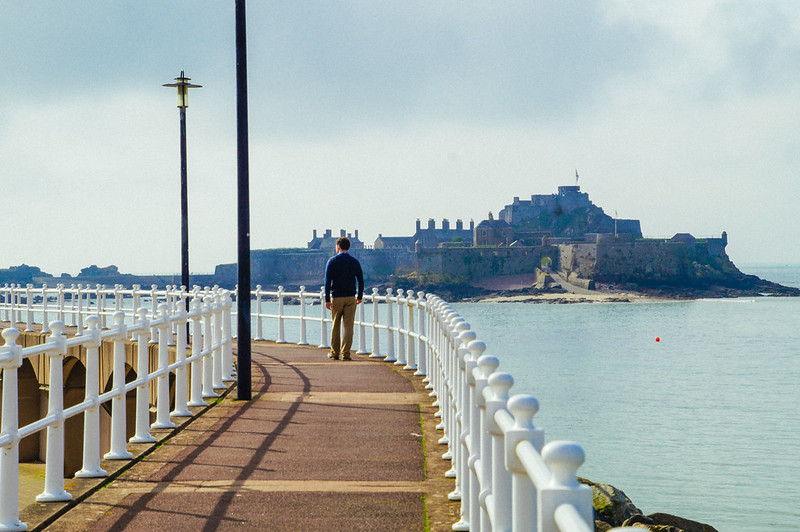 Gary walking beside the marina at Liberty Wharf, Jersey