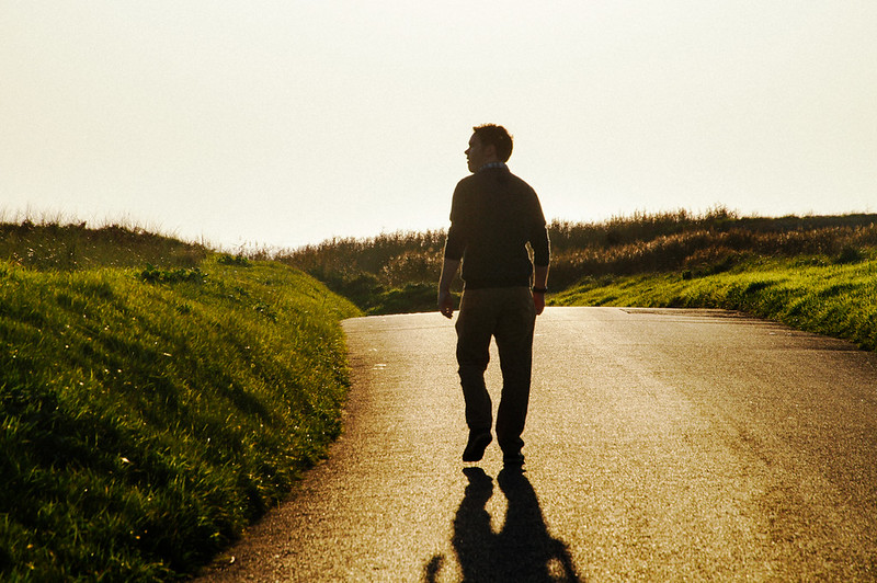 Gary walking along a country road near the Jersey Wetland Centre
