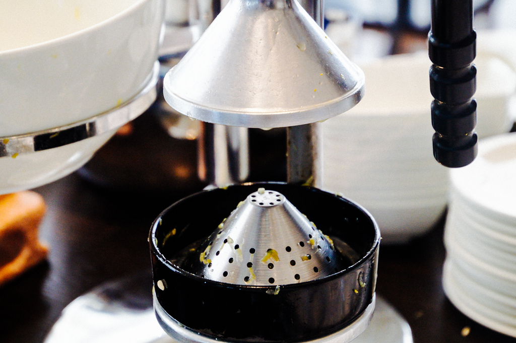 orange juice press on breakfast buffet in Gate hotel kaminarimon