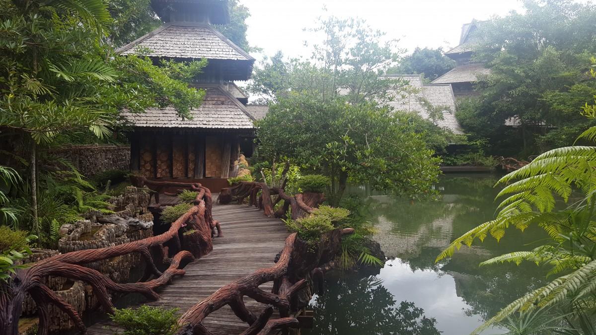 pond beside spa building of panviman chiang mai in thailand Pond beside spa building of Panviman Chiang Mai Spa Resort