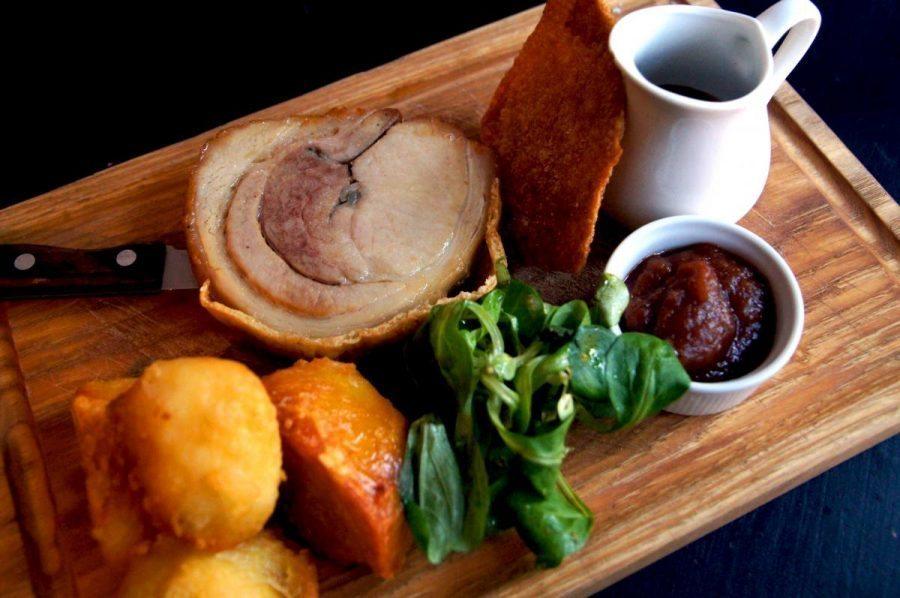 roasted suckling pig with crispy skin for dinner at the bel and dragon in odiham