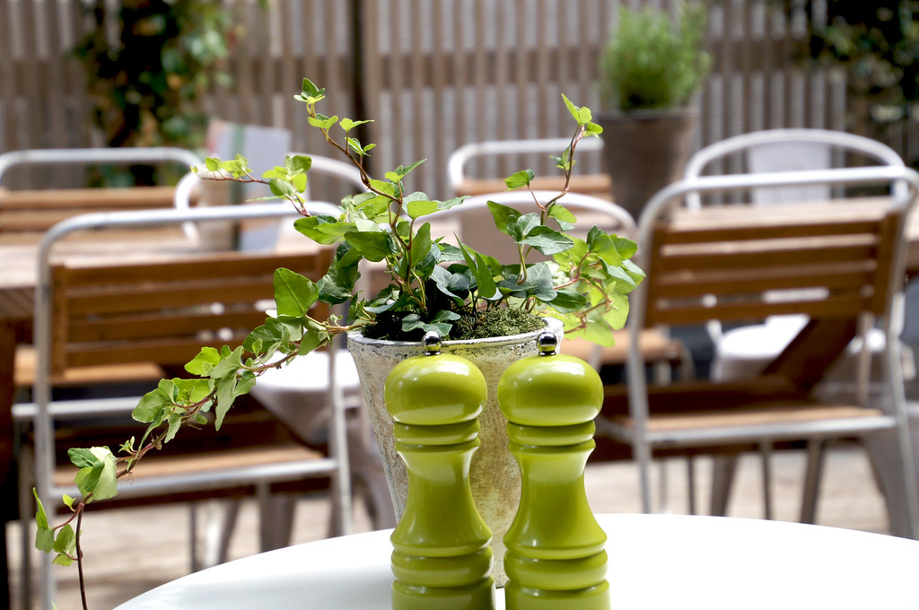 salt and pepper mill on table on outdoor terrace of no1 duke street richmond london