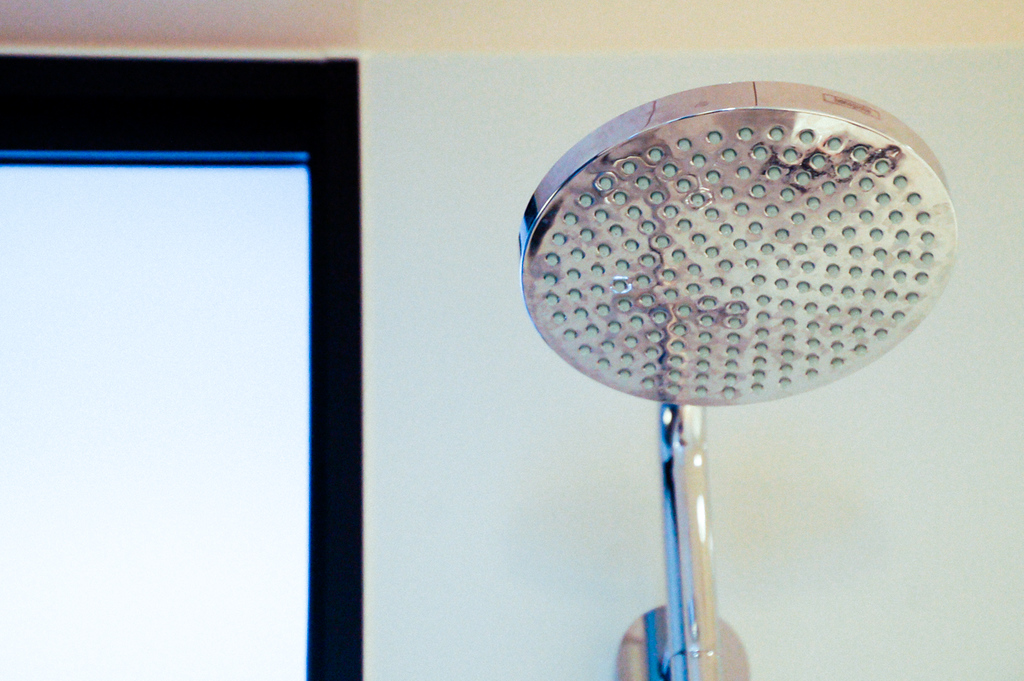 shower head in en suite bathroom in bedroom in Gate hotel kaminarimon