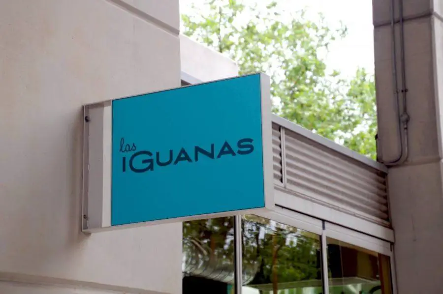 sign and logo of las iguanas latin american restaurant on brunswick square in London