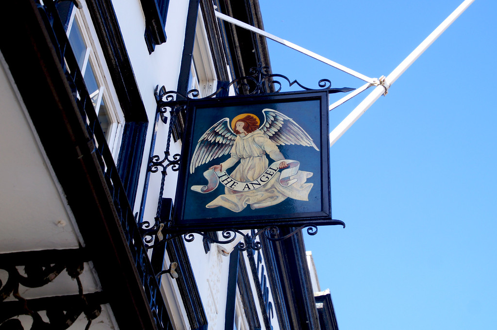 sign post of the angel hotel in guildford