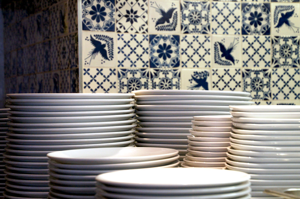 stack of dishes in rocket italian fusion restaurant in london stack of dishes in rocket italian fusion restaurant in london