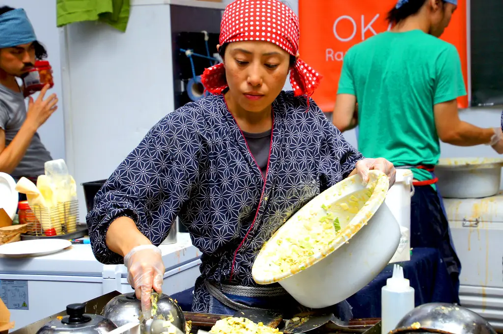 women preparing food at hyper japan women preparing food at hyper japan