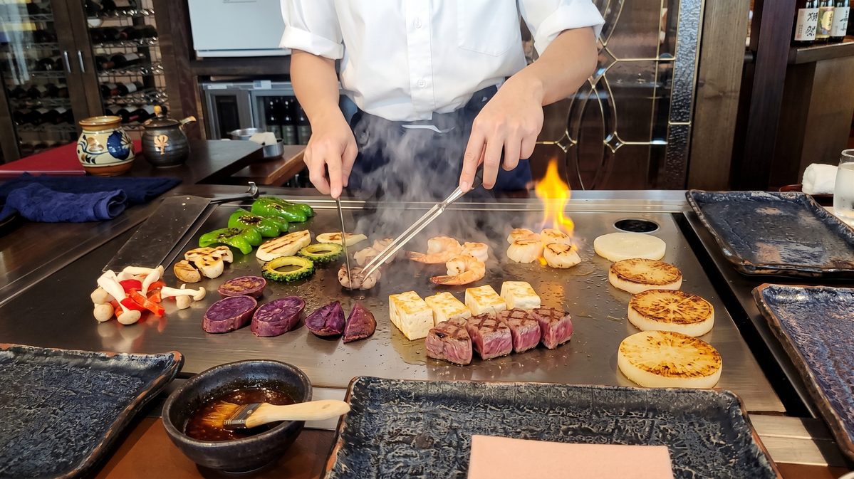 Food cooking on a teppanyaki grill in Okinawa