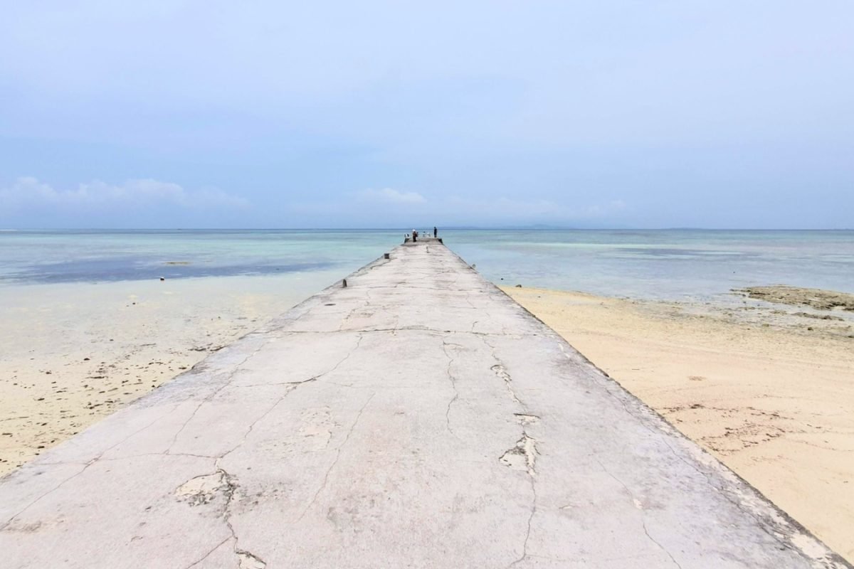 20190519 113707 edited West Pier extending over clear water on Taketomi Island