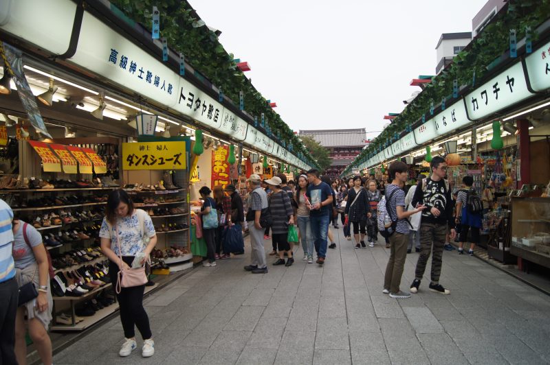 Asakusa 2015 5 Shoppers walking along Nakamise-dori's rows of snack and souvenir stalls in Asakusa