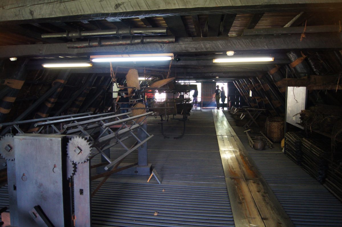 The timber interior of a traditional thatched farmhouse in Shirakawa-go.
