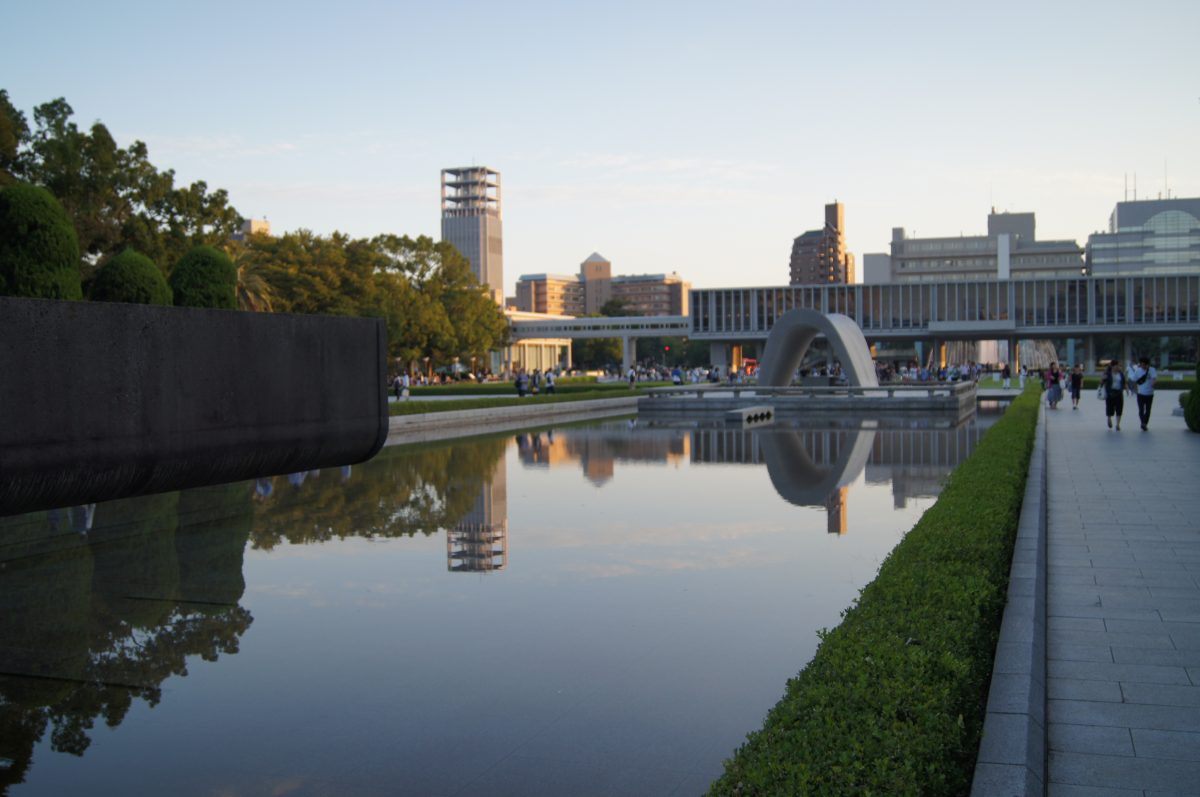 Wide view across Hiroshima Peace Memorial Park towards the Cenotaph and museum.