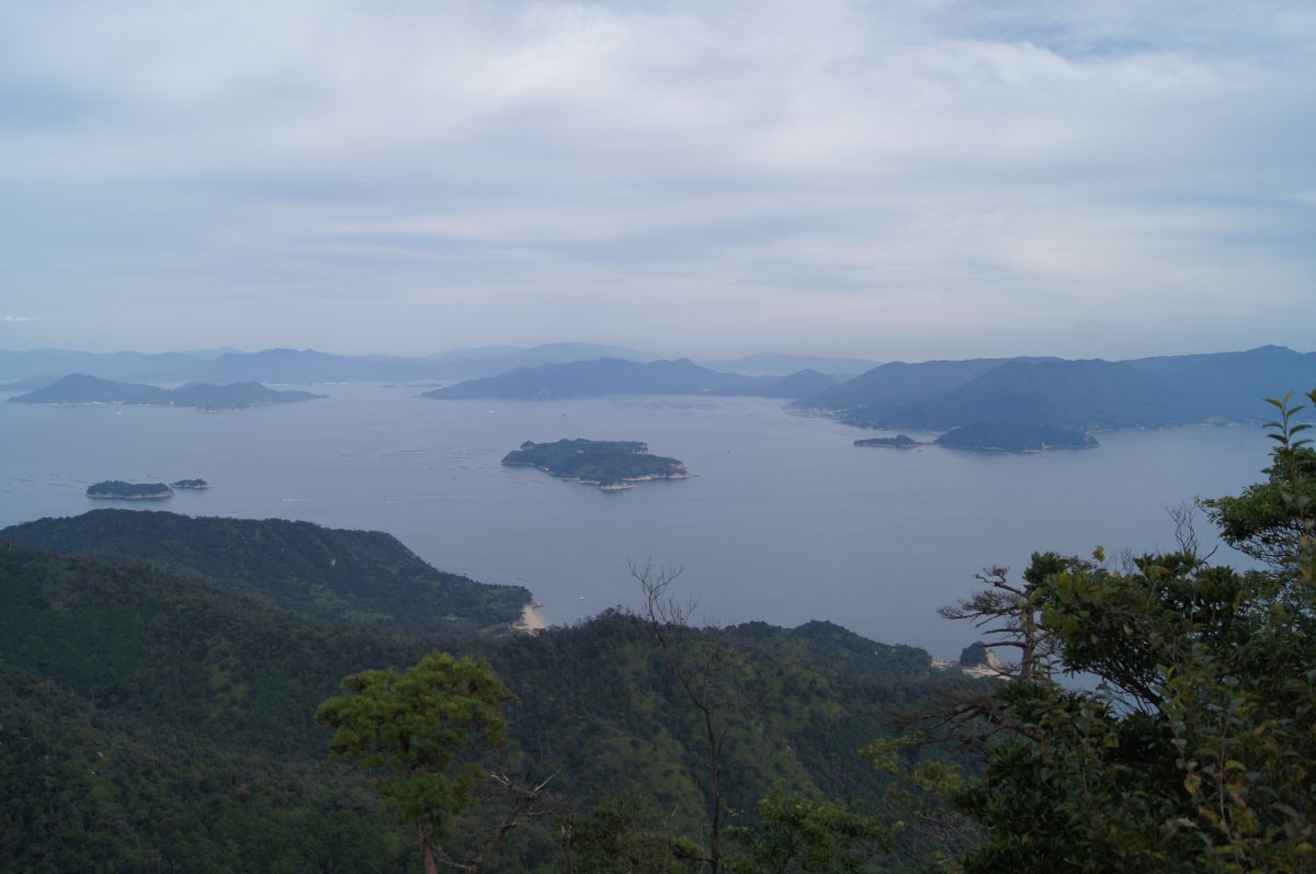 DSC06325 Several wooded islands sit in the Seto Inland Sea below Mount Misen on Miyajima, Japan.
