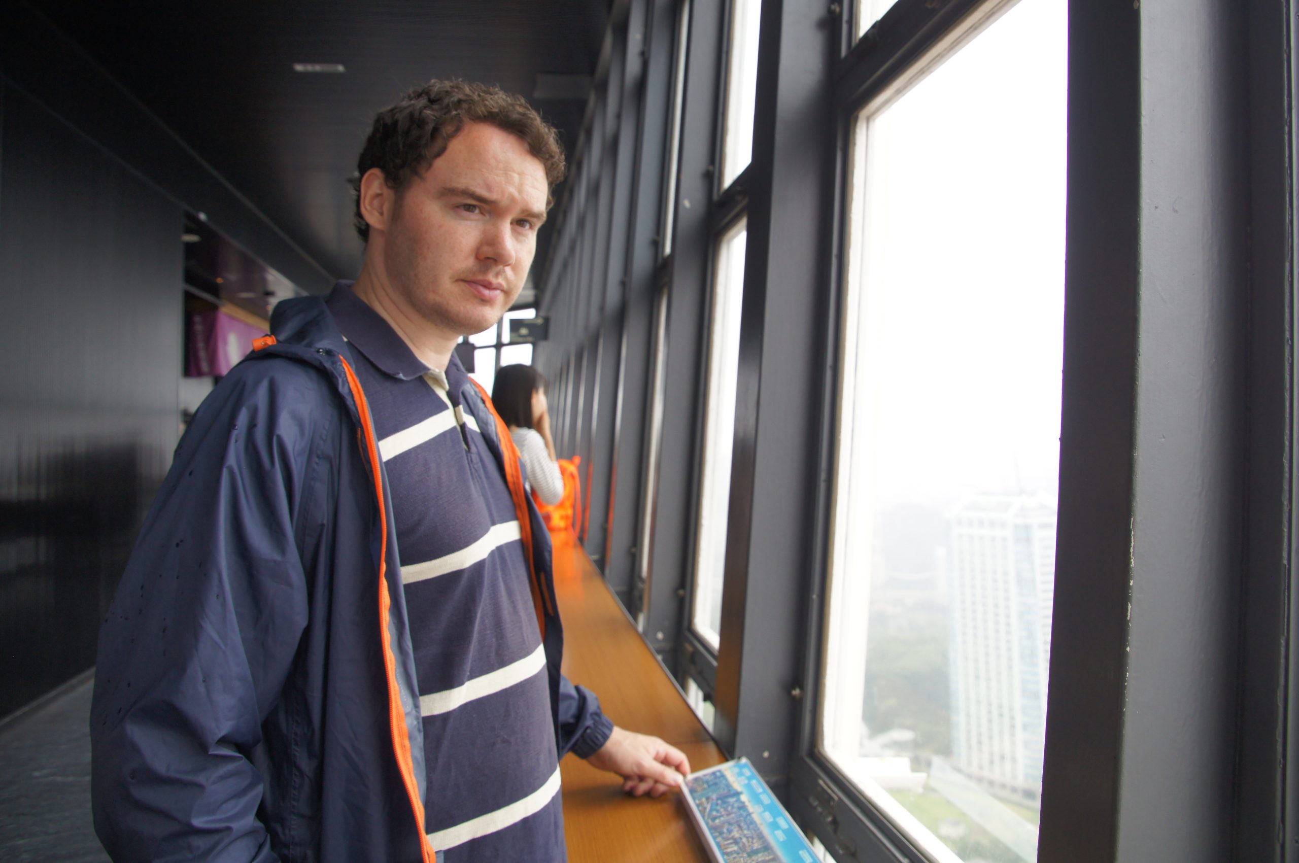 DSC07207 scaled Gary beside the windows inside Tokyo Tower in 2017