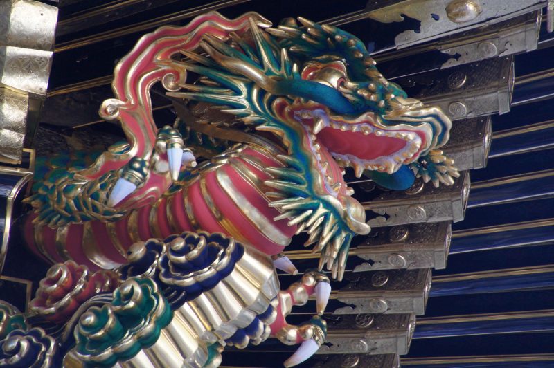 DSC07589 Colourful dragon carving beneath the eaves at Nikko Toshogu