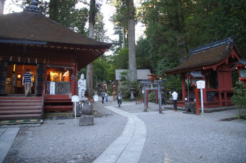 DSC07689 Gary entering a small shrine among cedar trees in Nikko