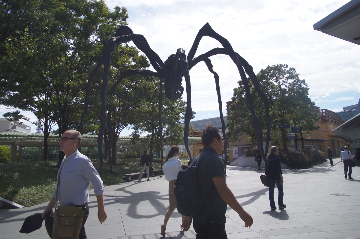 DSC08891 Copy People walking beneath the giant spider sculpture at Roppongi Hills