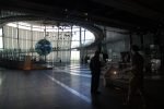 Visitors view the Geo-Cosmos globe inside Miraikan’s spacious exhibition atrium in Odaiba, Tokyo, Japan.